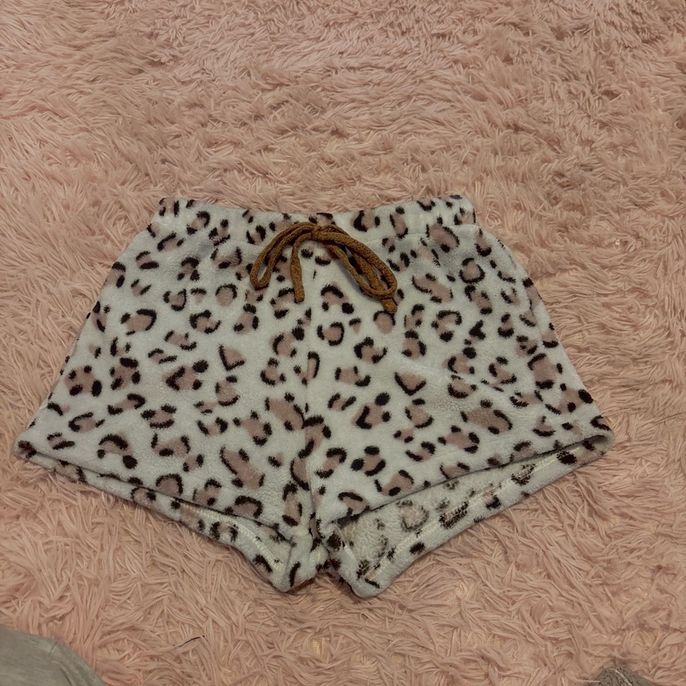 White and brown cheetah print fuzzy shorts
